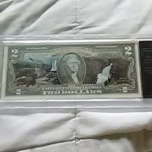 2- 2$ bills, 1-1$ bill 1957